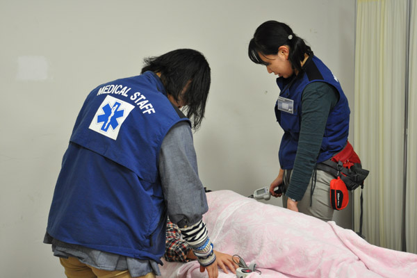 患者さんの様子を伺いつつ、バイタルチェック